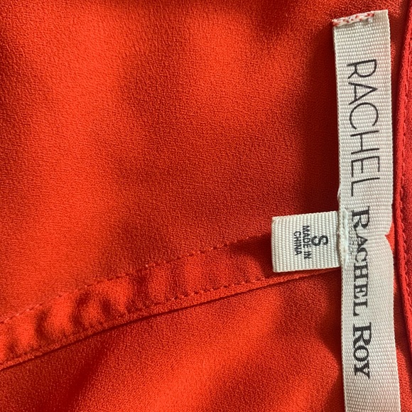 Orange Sleeveless Blouse with Asymmetrical Hem - Picture 7 of 7